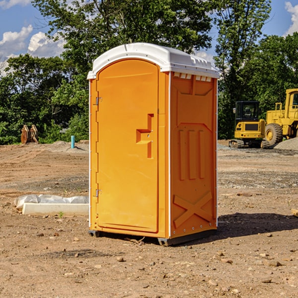 how often are the porta potties cleaned and serviced during a rental period in Almena